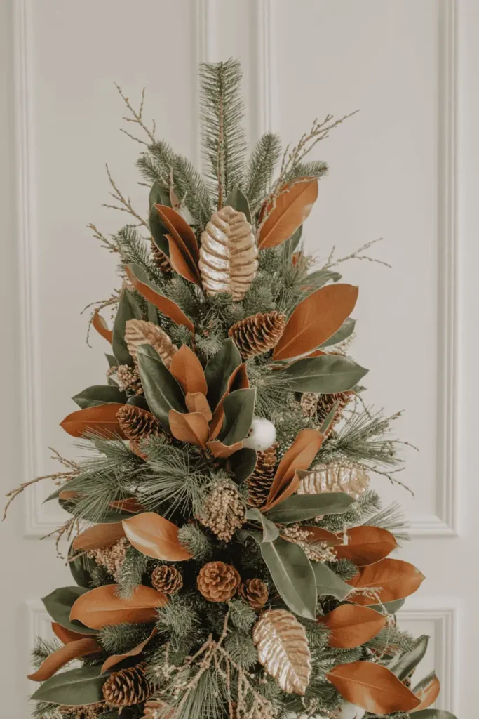 Nature-inspired luxe Christmas tree with pinecone accents.